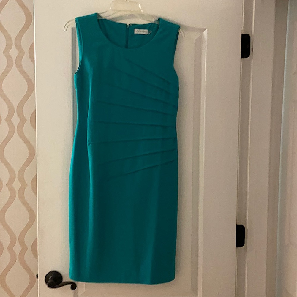 Calvin Klein green dress.